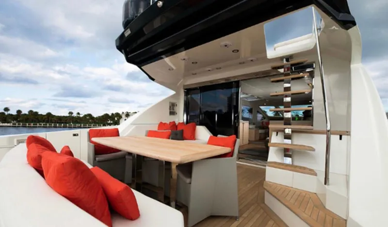 Slide: The Image of Luxurious 2019 Numarine 78 yacht deck with seating, table, and staircase. - 14