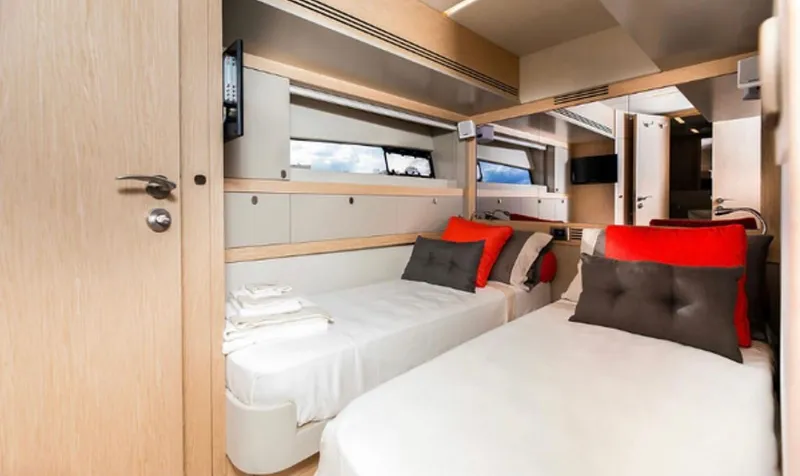 Slide: The Image of Luxurious interior of 2019 Numarine 78 yacht with twin beds and modern decor. - 18