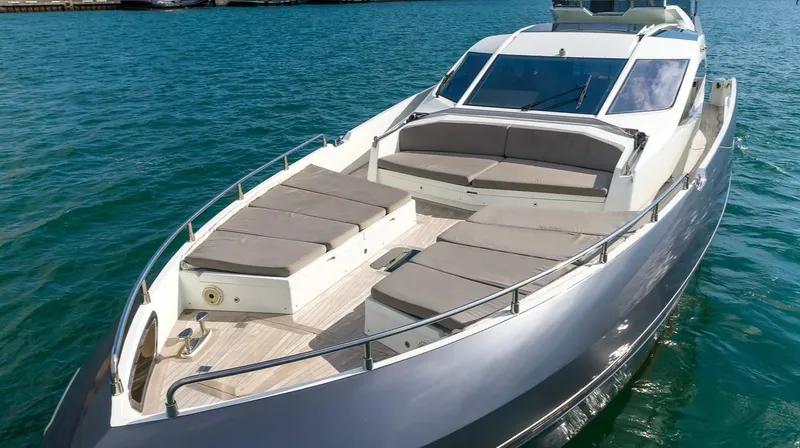 Slide: The Image of Luxury 2019 Numarine 78 yacht with spacious deck and sleek design on blue water. - 2
