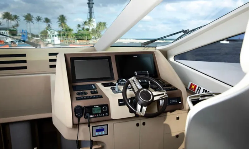 Slide: The Image of Cockpit of 2019 Numarine 78 yacht with modern controls and ocean view. - 22