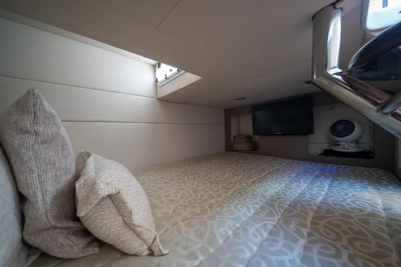 Slide: The Image of Interior cabin of 2018 Formula 350 Crossover Bowrider OB with cozy bedding and TV. - 16