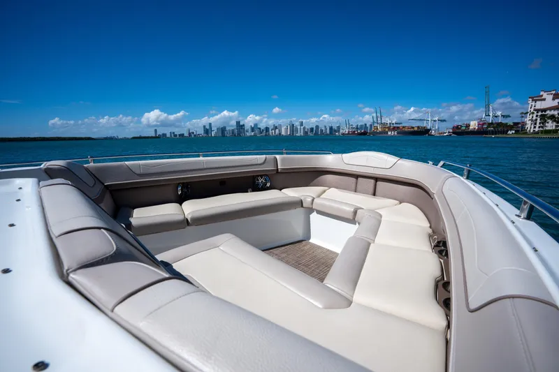 Slide: The Image of 2018 Formula 350 Crossover Bowrider OB on water with city skyline view. - 20