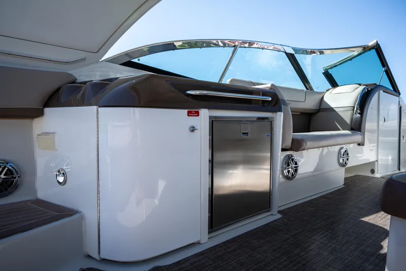 Slide: The Image of 2018 Formula 350 Crossover Bowrider OB interior with seating and stainless steel features. - 28
