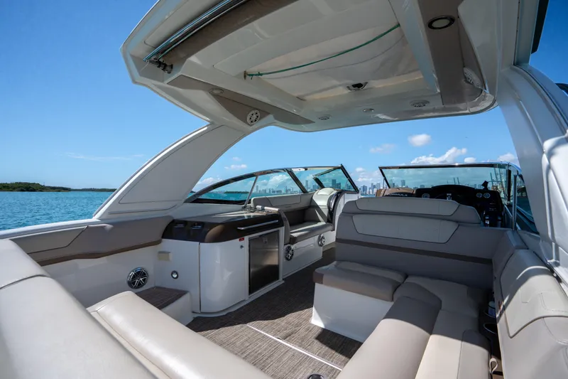 Slide: The Image of 2018 Formula 350 Crossover Bowrider OB interior with luxurious seating and open water view. - 35