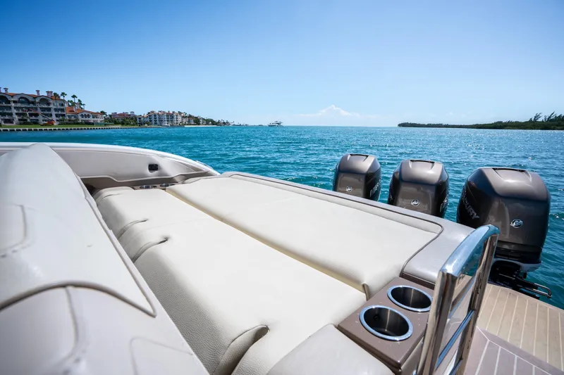 Slide: The Image of 2018 Formula 350 Crossover Bowrider OB on water, showcasing luxurious seating and powerful engines. - 39