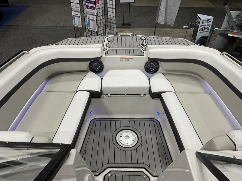 Slide: The Image of 2024 Starcraft SVX 190 OB DC boat interior with cushioned seating and modern design. - 2