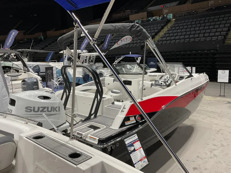 Slide: The Image of 2024 Starcraft SVX 190 OB DC boat with Suzuki outboard motor on display. - 6