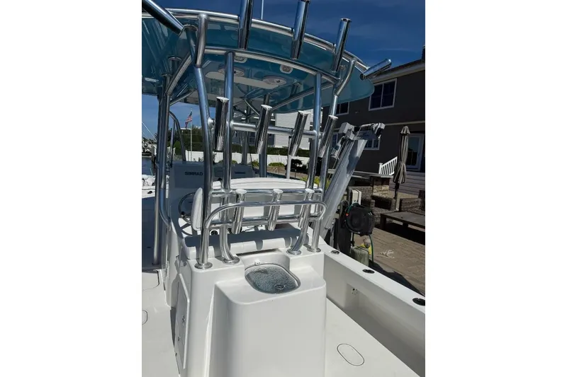 Slide: The Image of 2025 Tideline 235 Hybrid boat with sleek metal framework and modern design. - 11