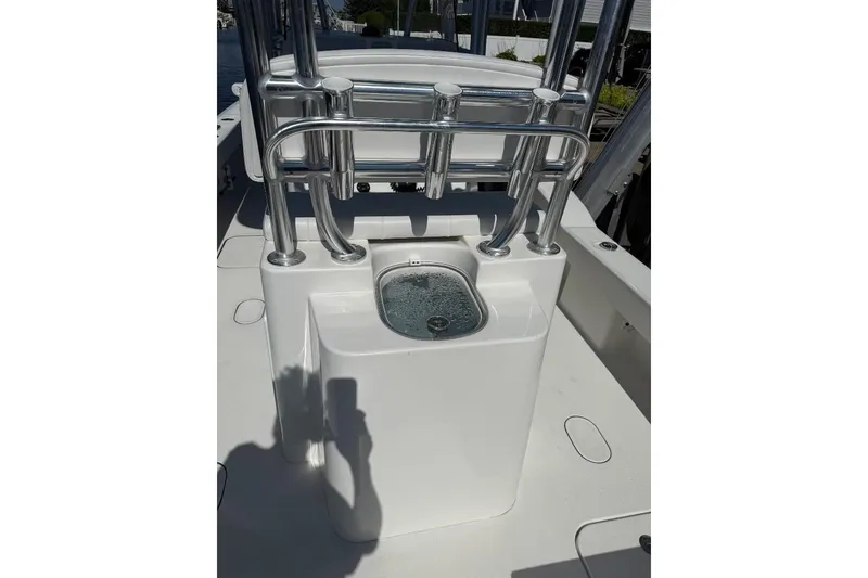 Slide: The Image of 2025 Tideline 235 Hybrid boat console with stainless steel rod holders and livewell. - 12