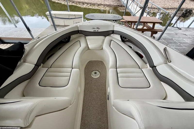 Slide: The Image of 2007 Sea Ray 290 SLX cabin interior with control panel and sink. - 27