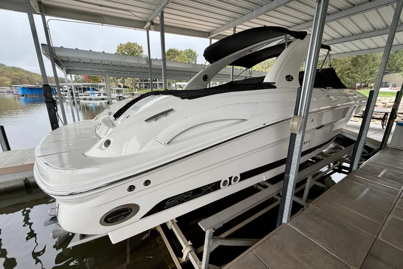 Slide: The Image of Close-up of a 2007 Sea Ray 290 SLX gauge showing 13.3 volts and 675 hours. - 5