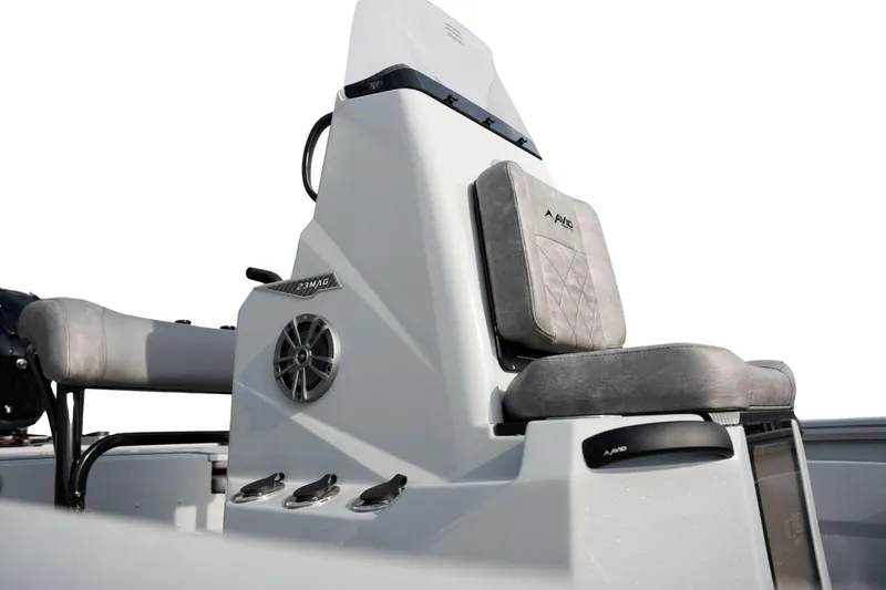 Slide: The Image of 2026 Avid 23 Mag boat console with cushioned seating and speaker detail. - 12