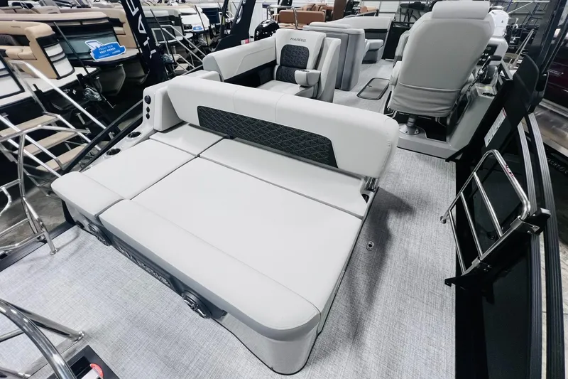 Slide: The Image of 2025 Harris Solstice 250 boat interior with luxurious seating and modern design. - 17