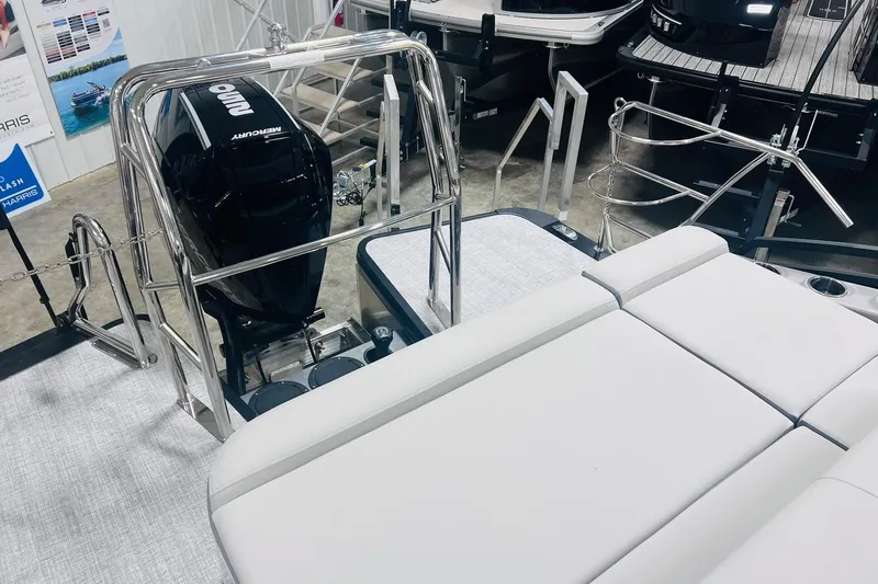 Slide: The Image of 2025 Harris Solstice 250 boat with Mercury outboard engine and sleek seating. - 22