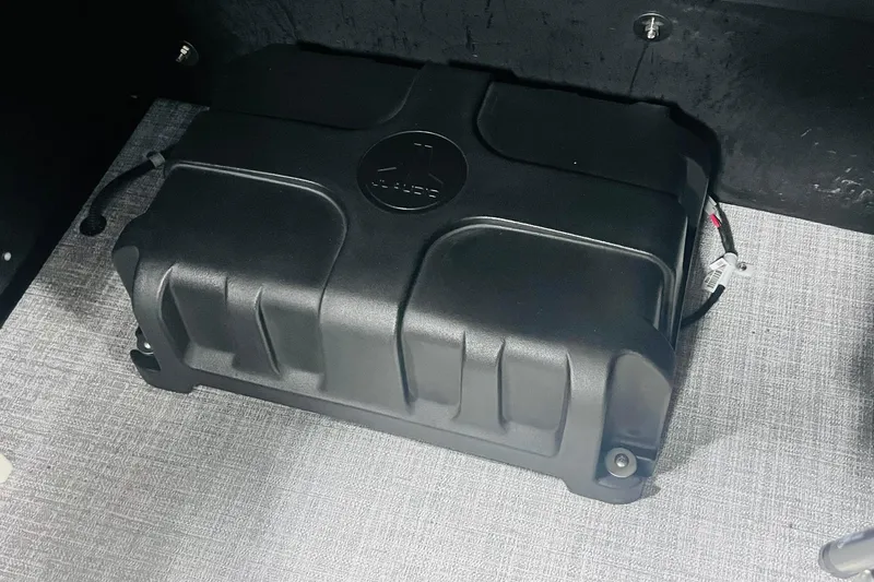 Slide: The Image of Battery compartment of 2025 Harris Solstice 250 boat, featuring a sleek black design. - 38