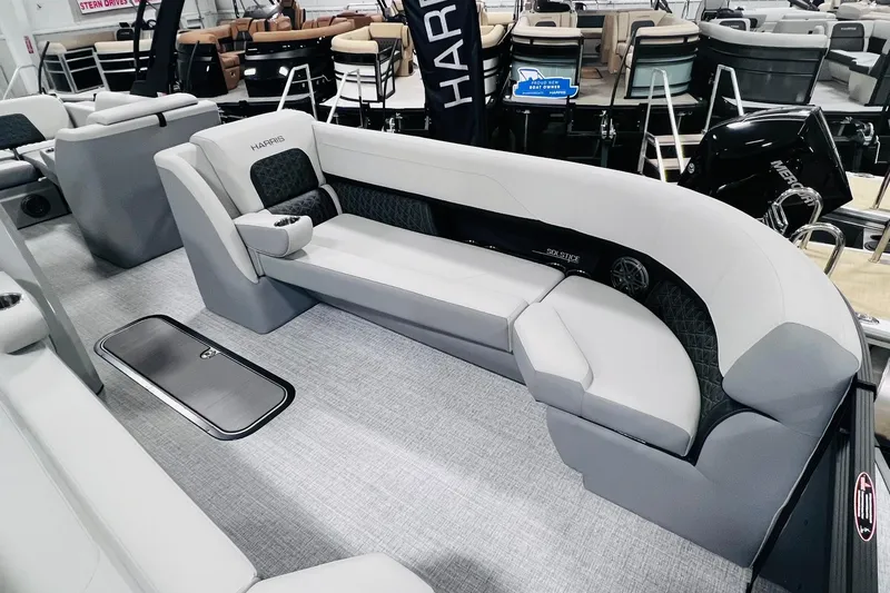 Slide: The Image of 2025 Harris Solstice 250 boat interior with luxurious seating and modern design. - 8