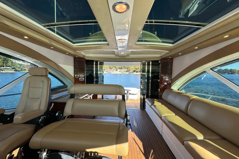 Slide: The Image of Luxurious interior of 2007 Sea Ray 60 Sundancer yacht with leather seating and panoramic windows. - 11