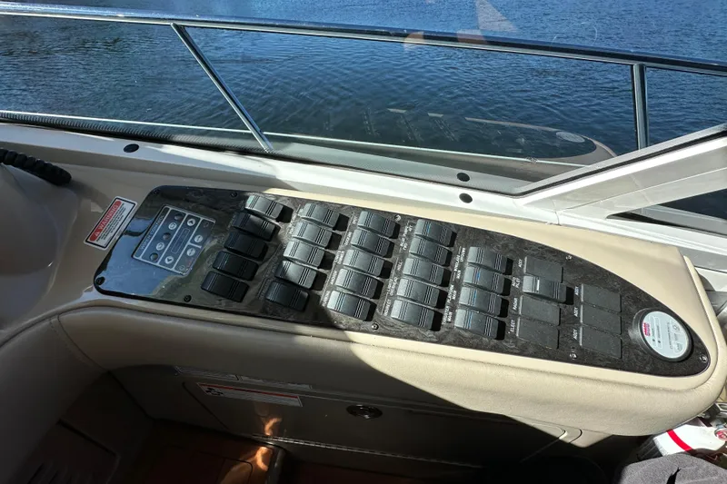 Slide: The Image of Control panel of a 2007 Sea Ray 60 Sundancer yacht, overlooking water. - 17