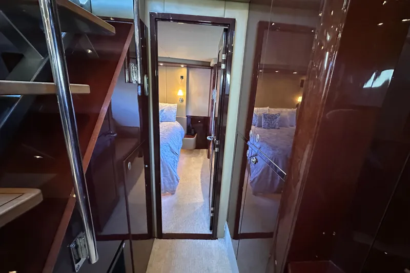 Slide: The Image of Luxurious interior of 2007 Sea Ray 60 Sundancer yacht with elegant bedroom view. - 24