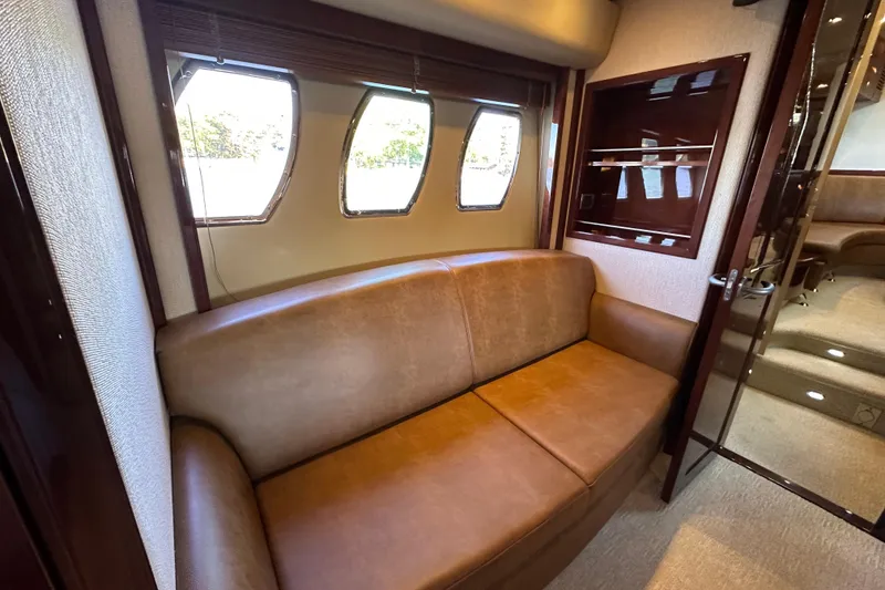 Slide: The Image of Luxurious interior of 2007 Sea Ray 60 Sundancer yacht with leather seating and elegant design. - 28