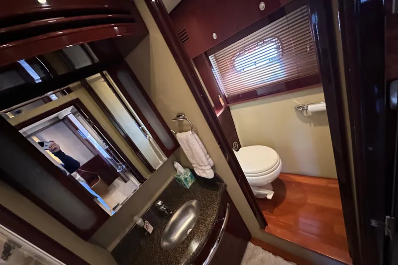 Slide: The Image of Luxurious bathroom interior of 2007 Sea Ray 60 Sundancer yacht with modern amenities. - 30