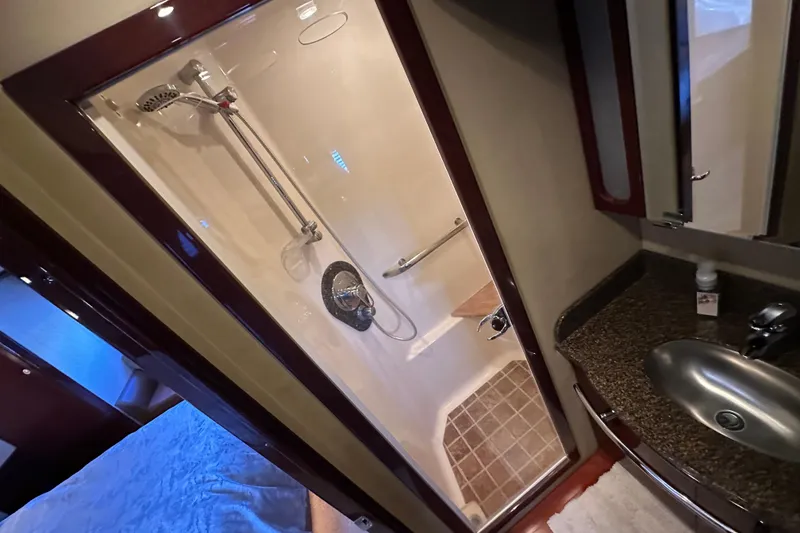 Slide: The Image of Luxurious bathroom in 2007 Sea Ray 60 Sundancer yacht with shower and sink. - 31