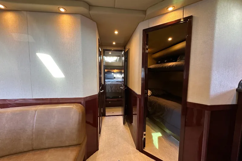 Slide: The Image of Luxurious interior of 2007 Sea Ray 60 Sundancer yacht with cozy cabins and elegant lighting. - 32