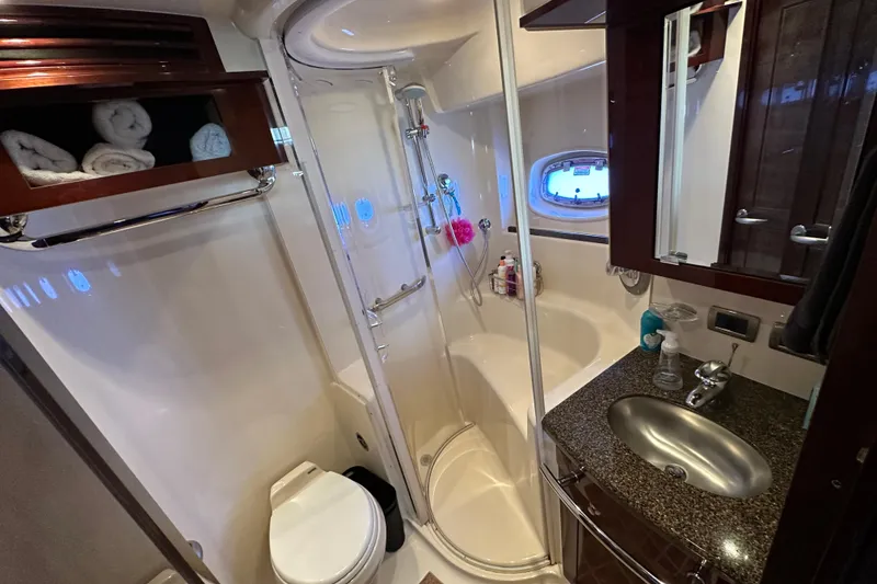 Slide: The Image of Luxurious bathroom in 2007 Sea Ray 60 Sundancer yacht with shower and sink. - 36