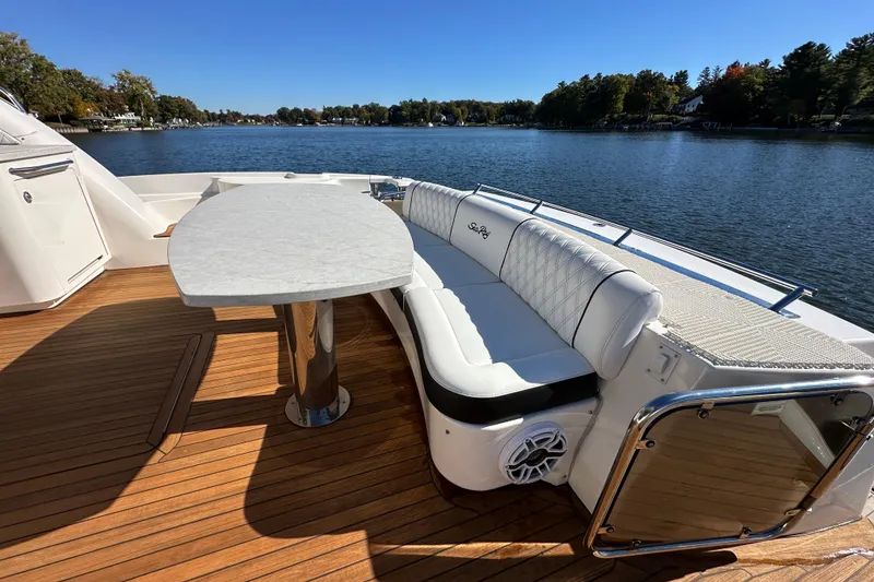 Slide: The Image of Luxurious 2007 Sea Ray 60 Sundancer yacht with elegant seating and scenic water view. - 6