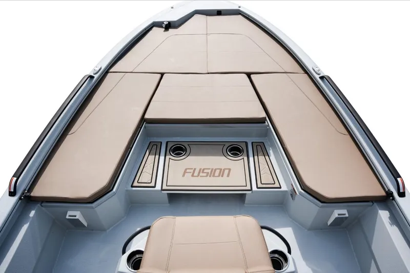 Slide: The Image of Avid 23 Fusion 2026 boat interior with tan seating and Fusion branding. - 10