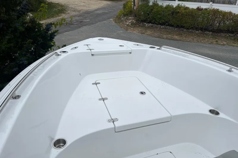 Slide: The Image of 2026 Cape Horn 22 OS boat deck with storage compartments and stainless steel fittings. - 10