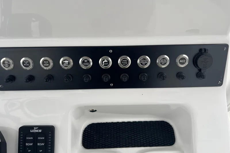 Slide: The Image of Control panel of a 2026 Cape Horn 22 OS boat with labeled switches. - 3