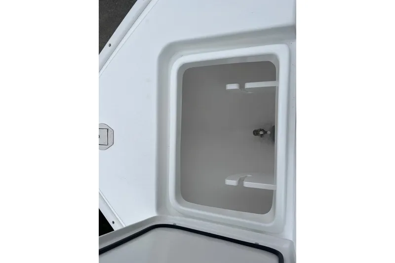 Slide: The Image of Open storage compartment on 2026 Cape Horn 22 OS boat. - 11