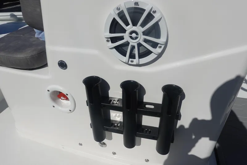 Slide: The Image of Avid 19 FSX 2026 boat with speaker and rod holders on deck. - 32