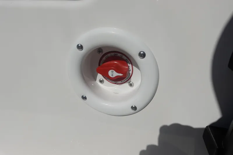 Slide: The Image of Red switch on Avid 19 FSX 2026 boat panel. - 33