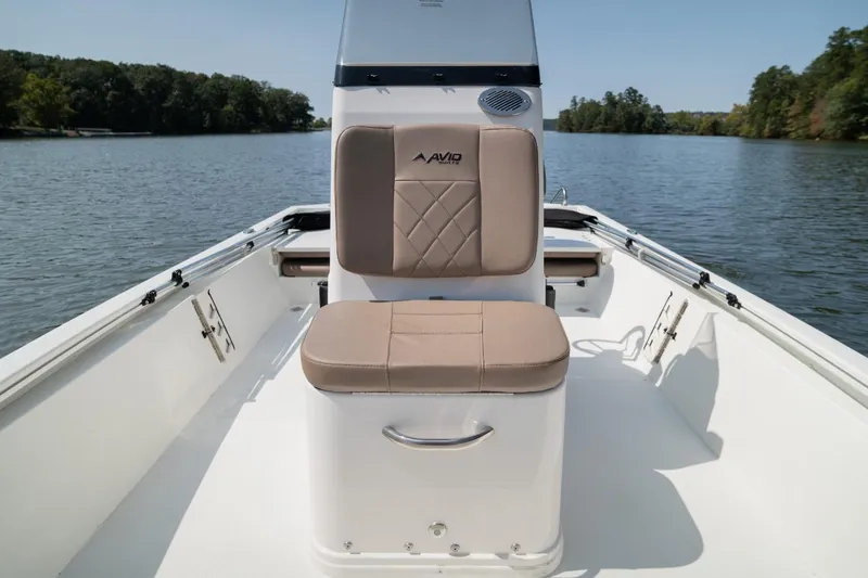 Slide: The Image of Avid 19 FSX 2026 boat logo on blue and white hull. - 6