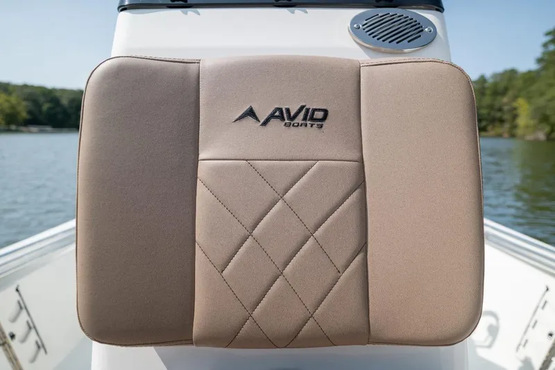 Slide: The Image of 2026 Avid 19 FSX boat with Yamaha 115 engine on trailer, parked outdoors. - 7