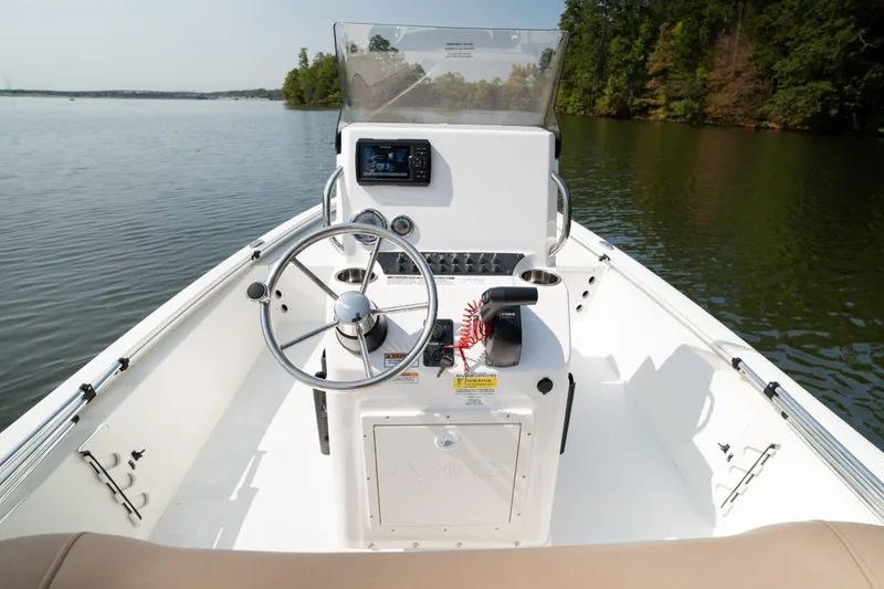 Slide: The Image of Yamaha SHO VMAX engine on 2026 Avid 19 FSX boat, outdoor setting. - 8