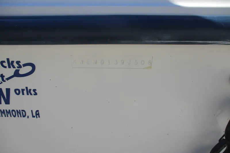 Slide: The Image of 2006 Key West 186 Dual Console boat with visible hull identification number. - 14