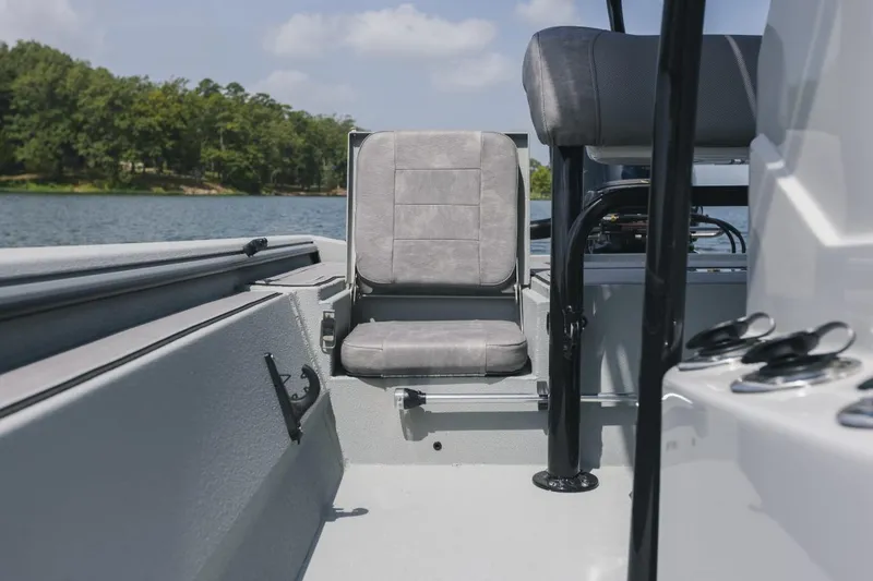 Slide: The Image of 2026 Avid 20 Rogue CC boat console with steering wheel and control panel. - 16