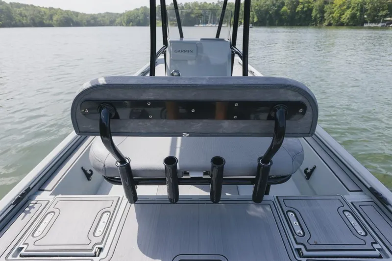 Slide: The Image of Control panel and storage compartment of 2026 Avid 20 Rogue CC boat. - 18