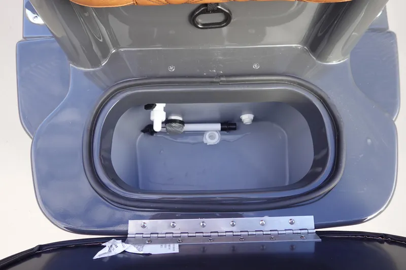 Slide: The Image of Open storage compartment in Avid 20 Rogue CC 2026 boat, featuring a sleek design. - 21