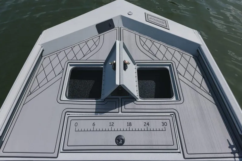 Slide: The Image of 2026 Avid 20 Rogue CC boat seat with brown leather upholstery and logo. - 9