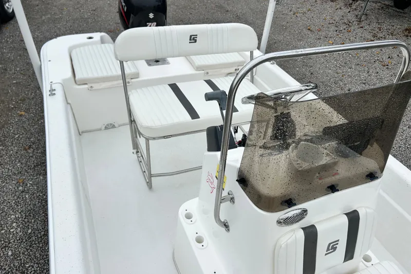 Slide: The Image of 2011 Carolina Skiff JVX18CC boat interior with seating and steering console. - 29