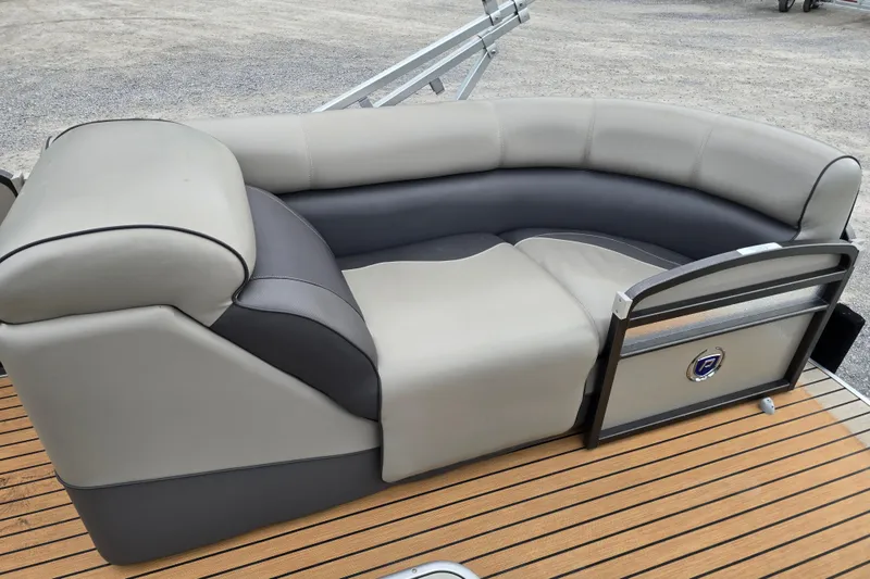 Slide: The Image of Close-up of 2015 Premier 230 SunSation RF pontoon boat's bow with cleat and bumper. - 15