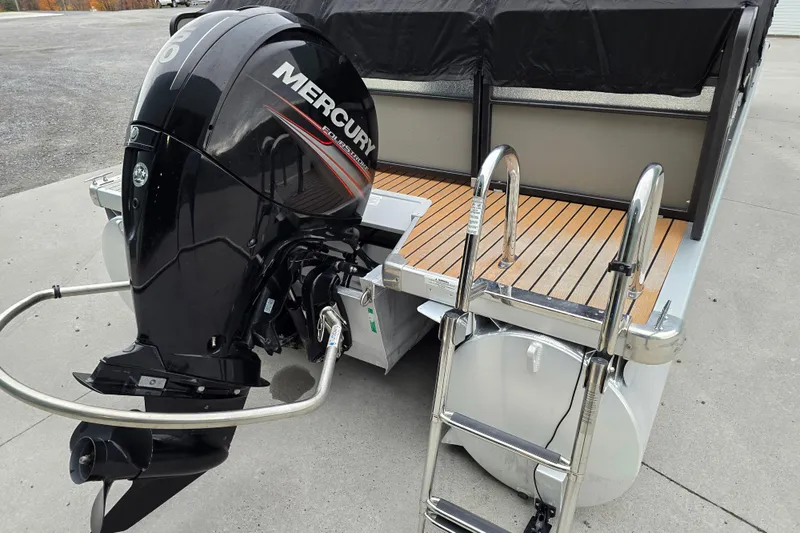 Slide: The Image of 2015 Premier 230 SunSation RF boat with Mercury outboard motor and swim ladder. - 20
