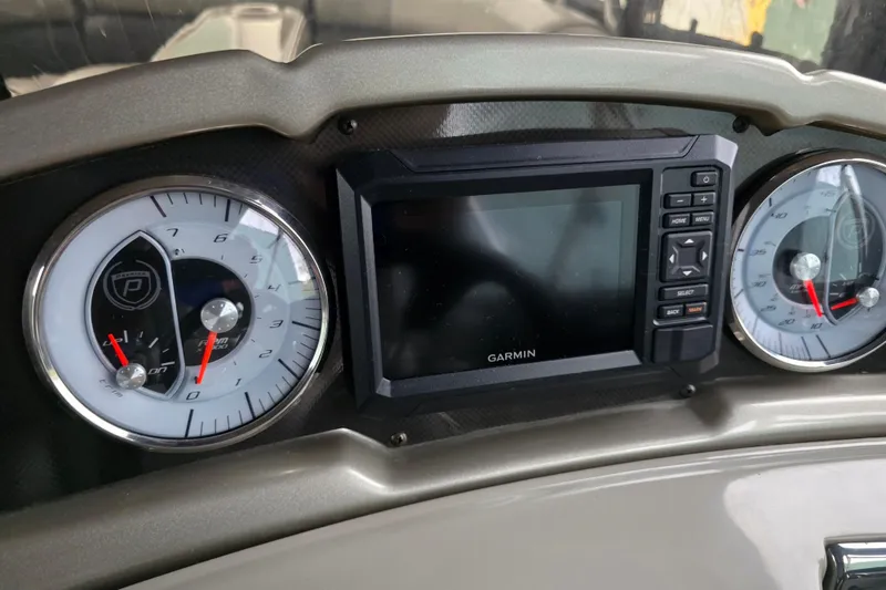 Slide: The Image of Dashboard of 2015 Premier 230 SunSation RF with Garmin display and gauges. - 25