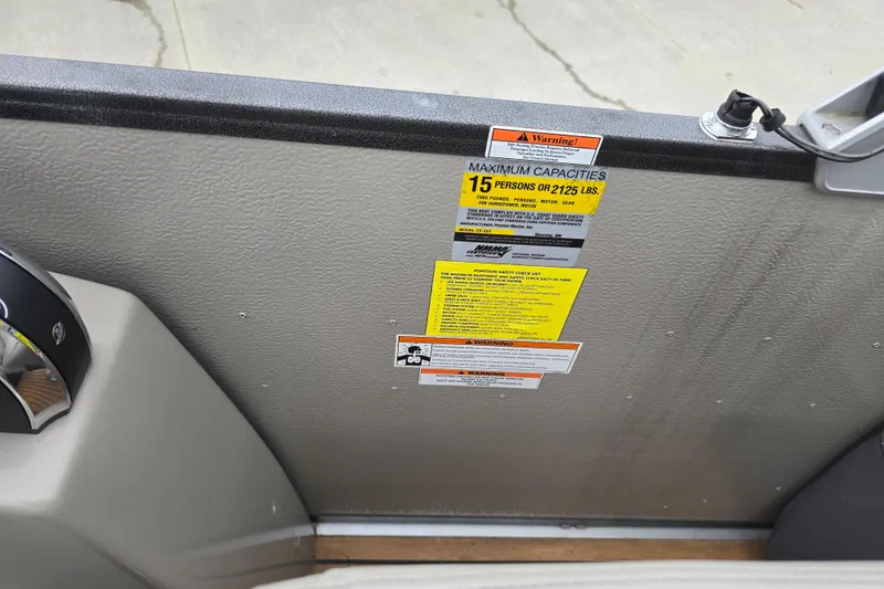 Slide: The Image of 2015 Premier 230 SunSation RF boat capacity label, maximum 15 persons or 2125 lbs. - 26