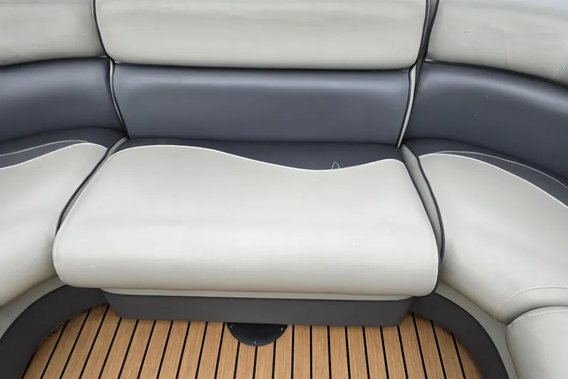 Slide: The Image of Premier 230 SunSation RF 2015 boat seating with gray and beige upholstery. - 34