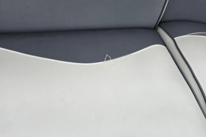 Slide: The Image of Torn upholstery on 2015 Premier 230 SunSation RF boat seat. - 35